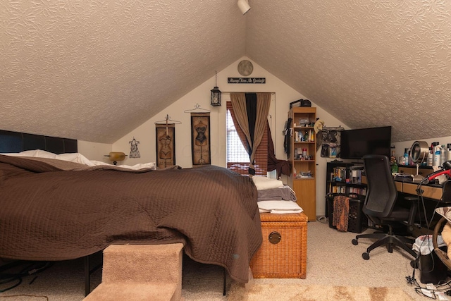 carpeted bedroom with a textured ceiling and vaulted ceiling