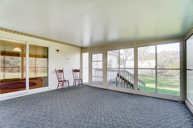 unfurnished sunroom with plenty of natural light