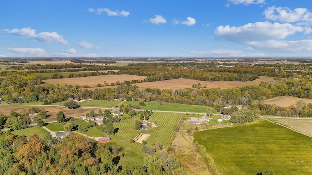 birds eye view of property with a rural view