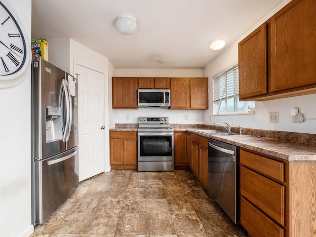 kitchen featuring appliances with stainless steel finishes and sink