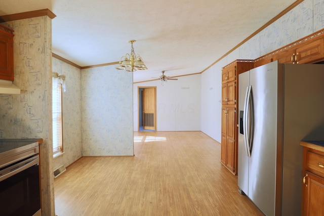 kitchen featuring white electric range oven, stainless steel fridge, light wood-type flooring, and crown molding