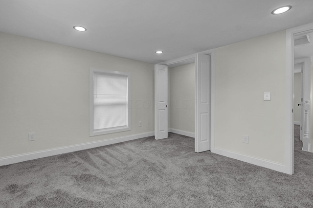 unfurnished bedroom featuring carpet floors