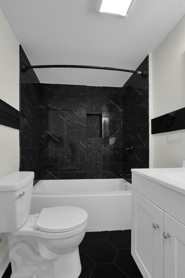 bathroom with tile patterned floors, toilet, and vanity