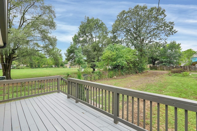 deck featuring a yard