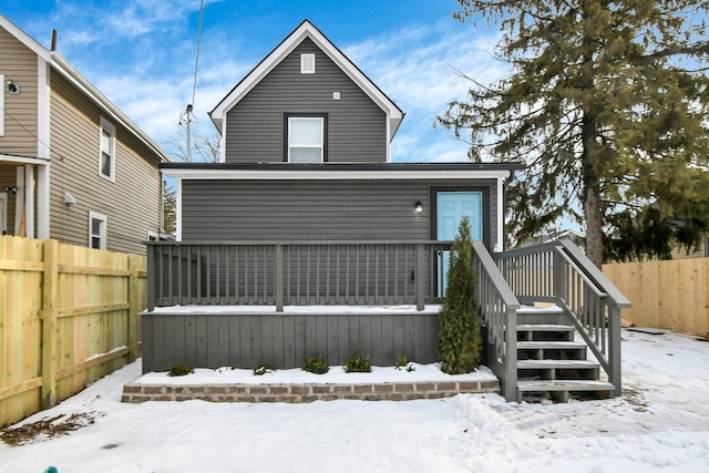 view of snow covered property