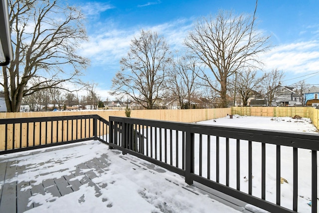 view of snow covered deck