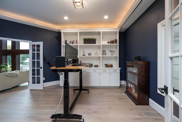 office space with french doors and light hardwood / wood-style floors