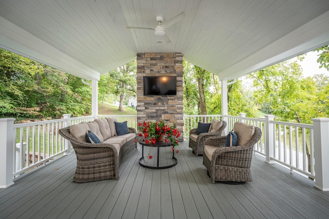 wooden deck featuring ceiling fan and an outdoor hangout area