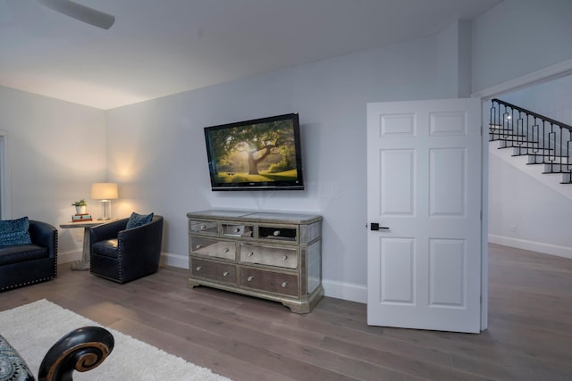 living room with dark hardwood / wood-style floors