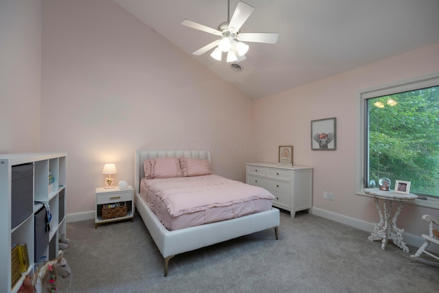 bedroom with carpet flooring, ceiling fan, and vaulted ceiling