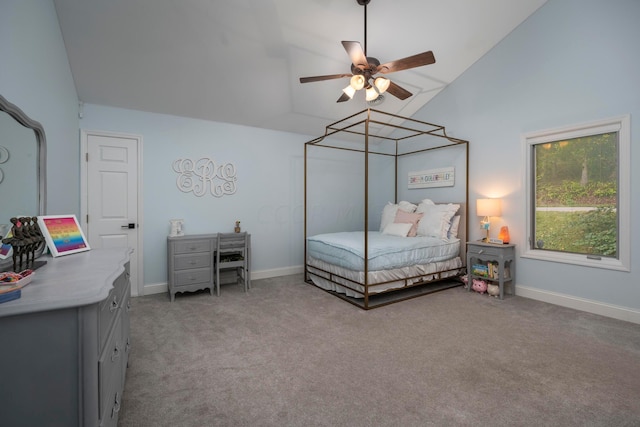 carpeted bedroom featuring high vaulted ceiling and ceiling fan