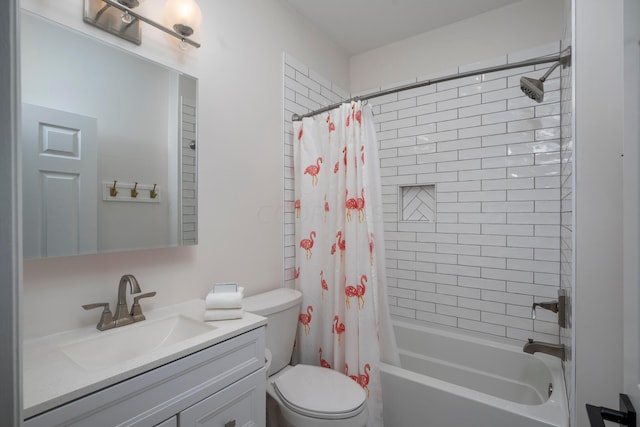 full bathroom featuring shower / tub combo, vanity, and toilet