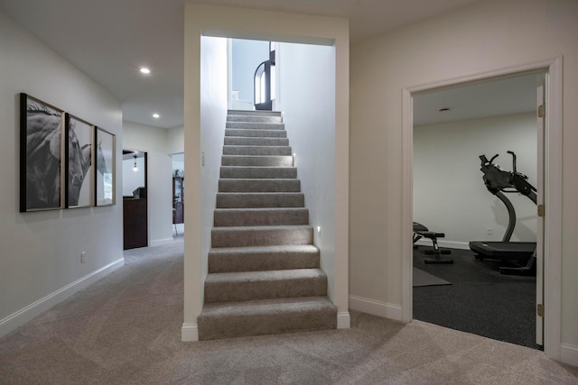 stairway with carpet floors