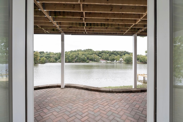 view of patio / terrace featuring a water view