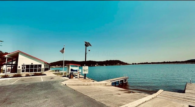 view of dock with a water view