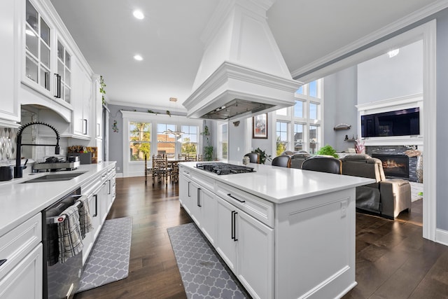 kitchen featuring sink, black dishwasher, dark hardwood / wood-style floors, white cabinets, and custom exhaust hood