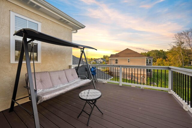 view of deck at dusk