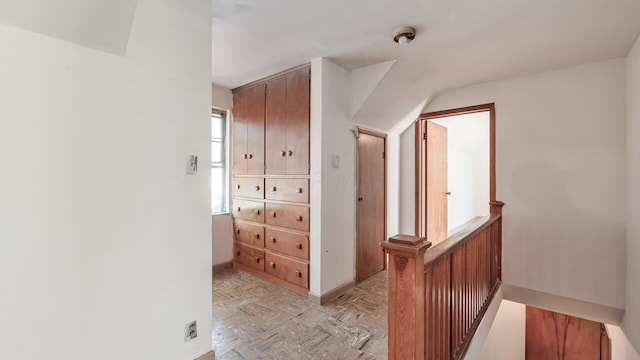 corridor featuring light parquet floors