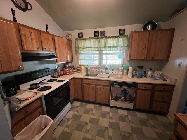 kitchen featuring dishwasher, electric range, vaulted ceiling, and sink