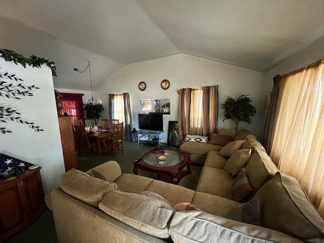 living room with carpet and vaulted ceiling