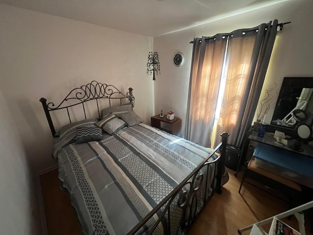 bedroom featuring hardwood / wood-style floors