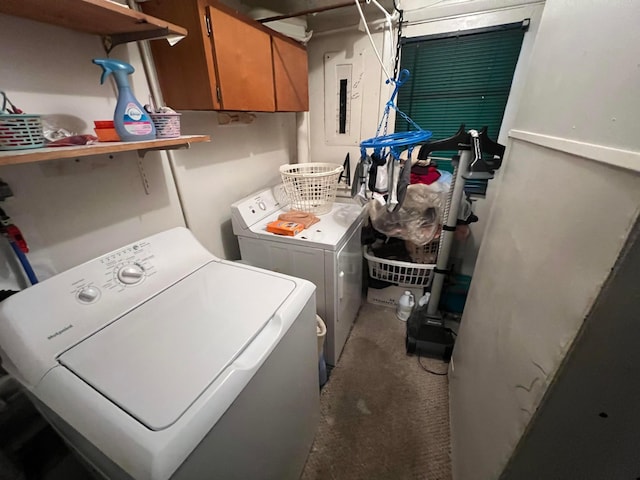 laundry area featuring washer and clothes dryer, carpet flooring, and cabinets