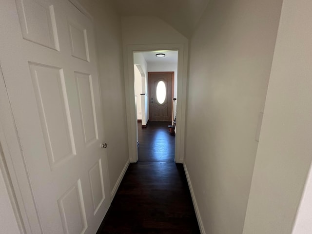 hall with dark hardwood / wood-style floors