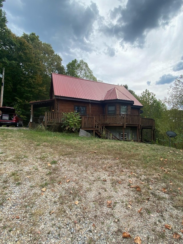 exterior space featuring a deck