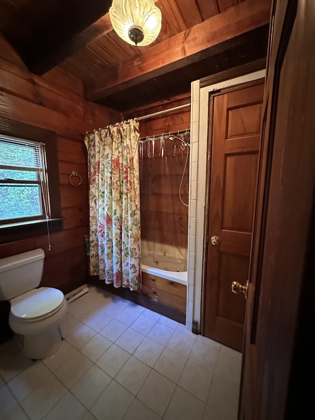 bathroom featuring beam ceiling, tile patterned flooring, toilet, wooden walls, and shower / tub combo