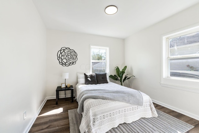 bedroom featuring dark hardwood / wood-style floors