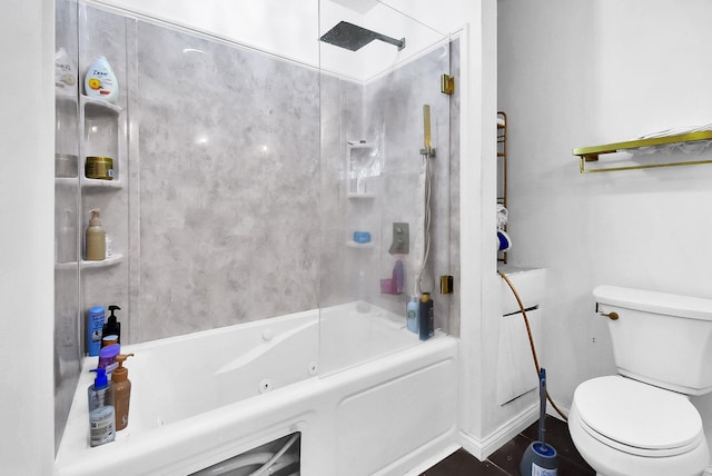 bathroom featuring tile patterned floors,  shower combination, and toilet