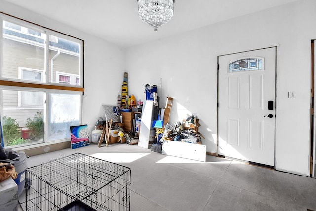 entrance foyer with an inviting chandelier