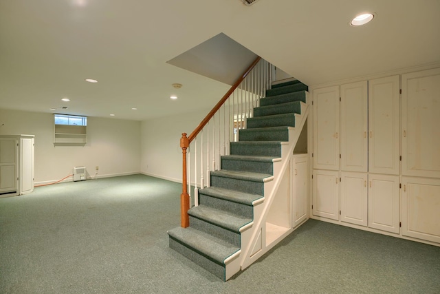 basement with light carpet