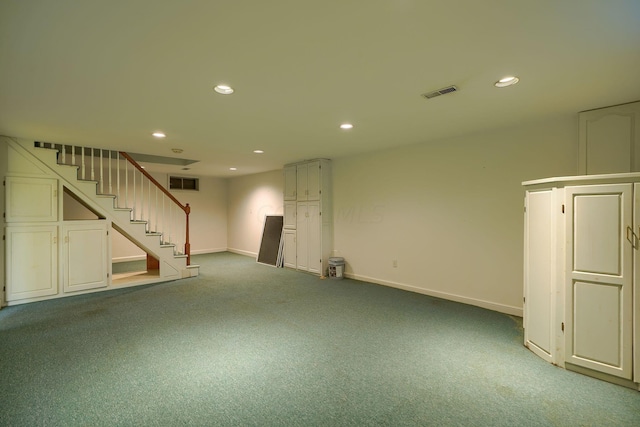 basement featuring carpet flooring