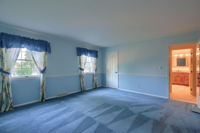 empty room with carpet floors