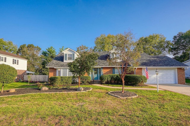 cape cod home featuring a garage and a front lawn