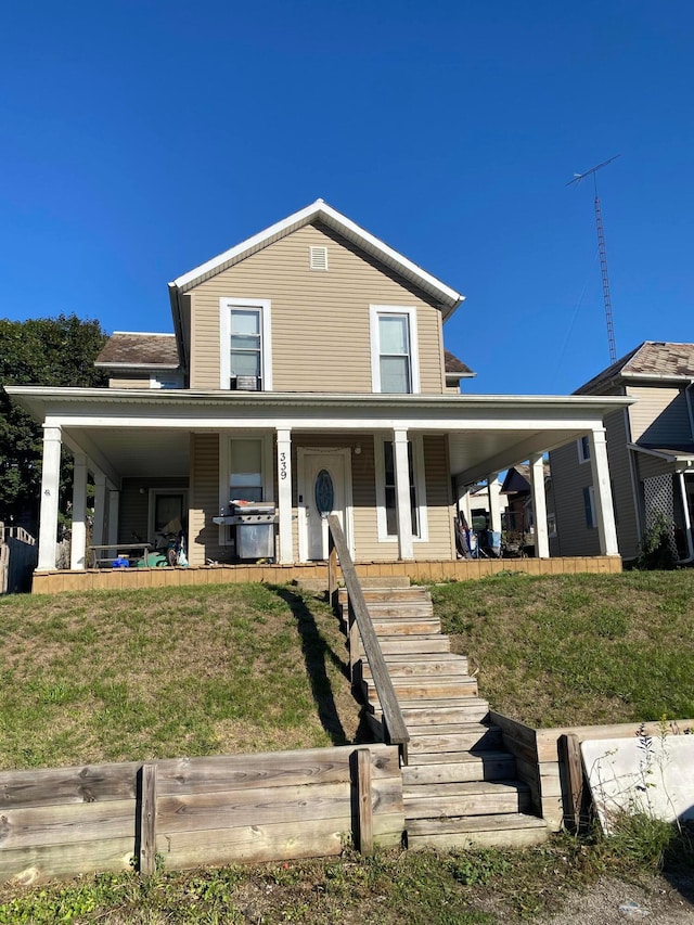 view of front of property featuring a front yard