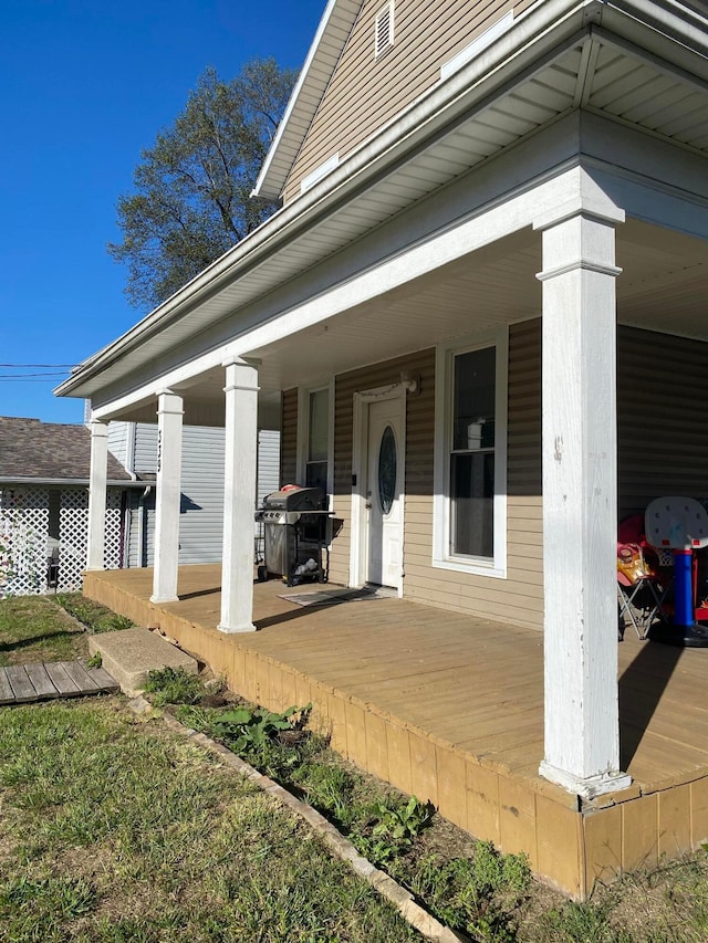 entrance to property with covered porch