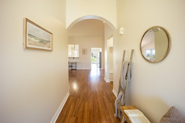 hall with dark hardwood / wood-style floors