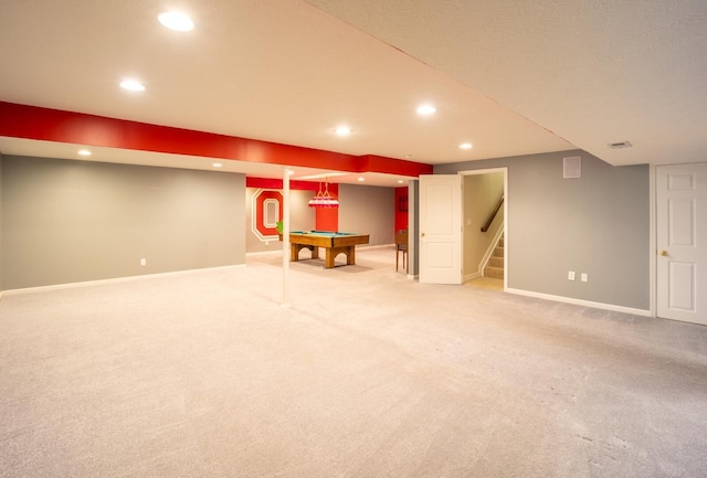 basement with carpet flooring