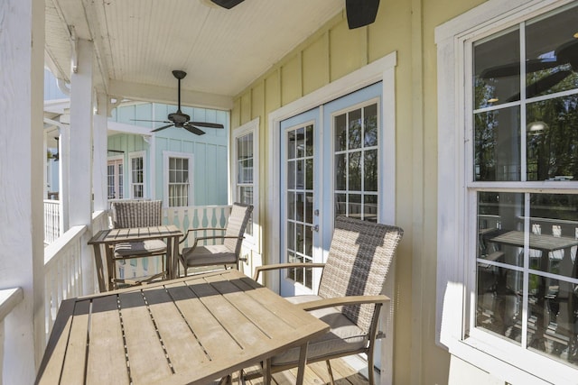 exterior space with ceiling fan