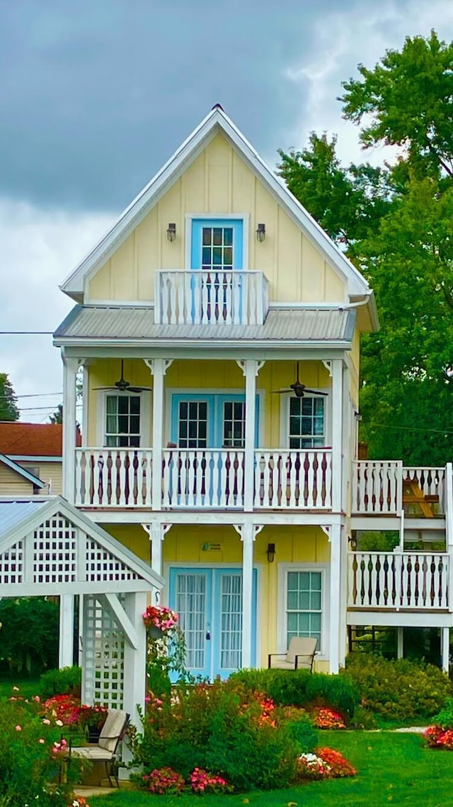 rear view of house with a balcony