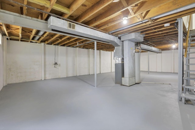 basement featuring heating unit