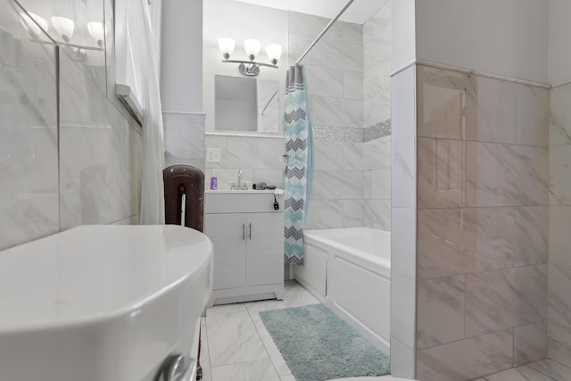 bathroom featuring vanity, radiator, tile walls, shower / tub combo, and a chandelier