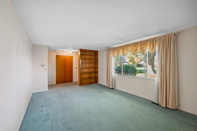 unfurnished room with carpet