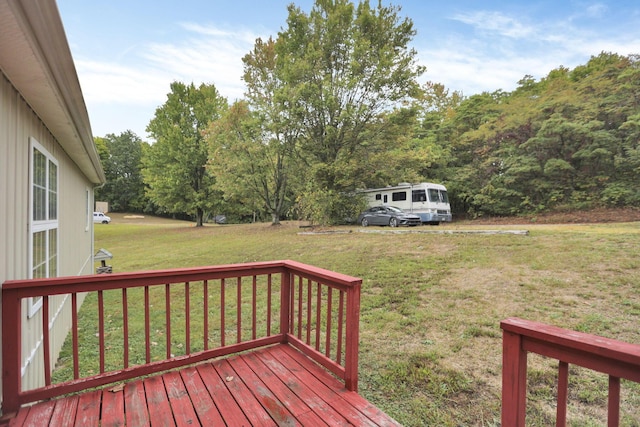 deck featuring a yard