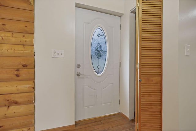 foyer entrance featuring hardwood / wood-style floors