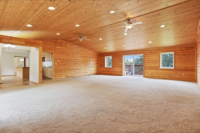 unfurnished living room with ceiling fan with notable chandelier, lofted ceiling, light carpet, and wooden ceiling