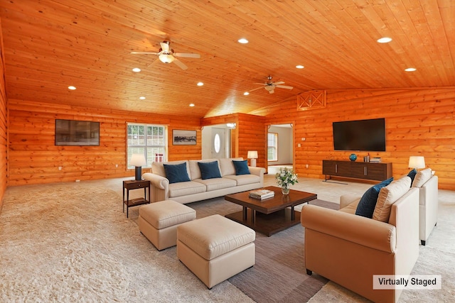 carpeted living room featuring wooden walls, ceiling fan, wood ceiling, and lofted ceiling