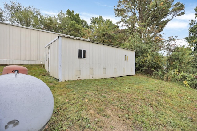 view of outdoor structure with a yard